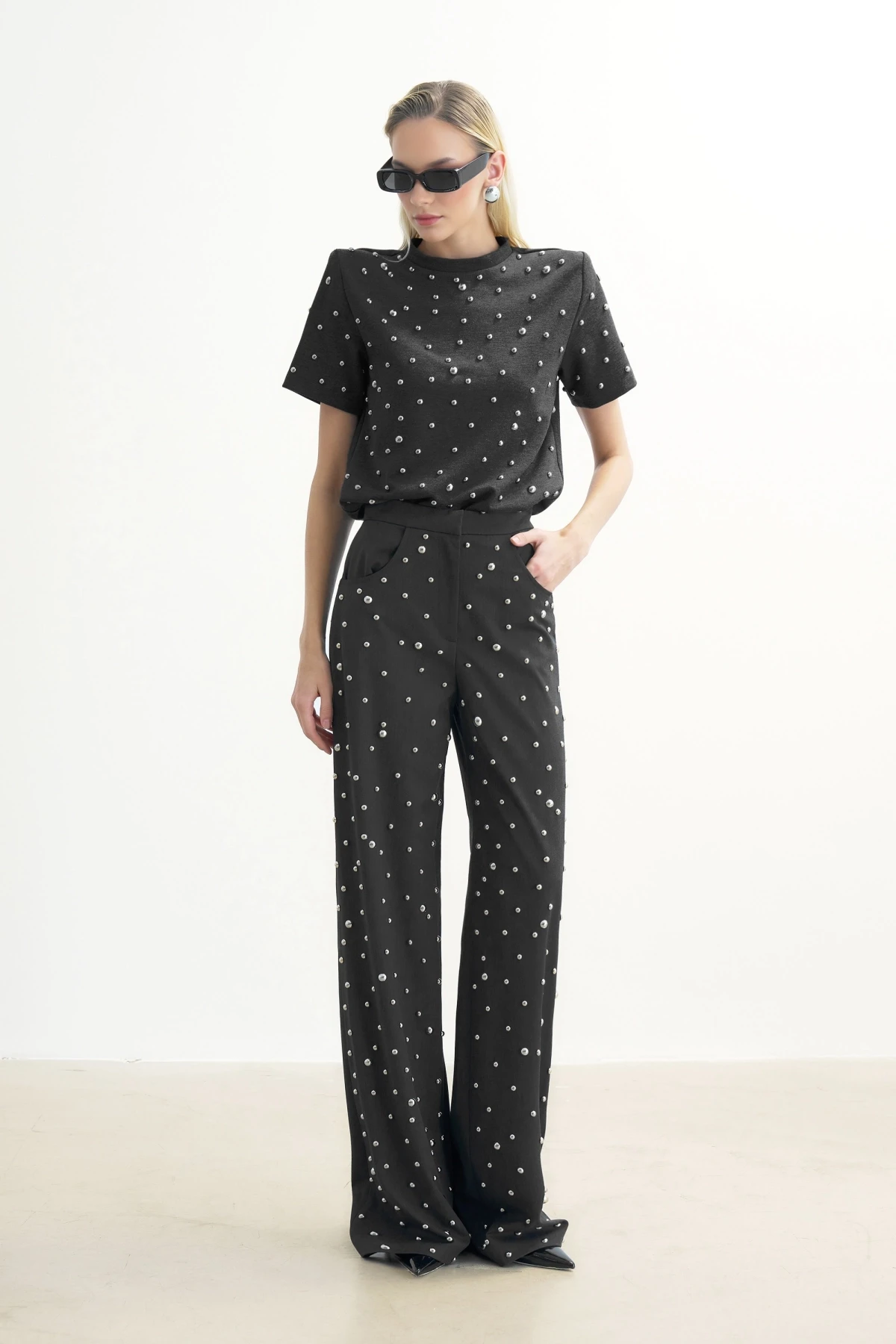 GRAY TROUSERS WITH METALLIC STONE PRINT