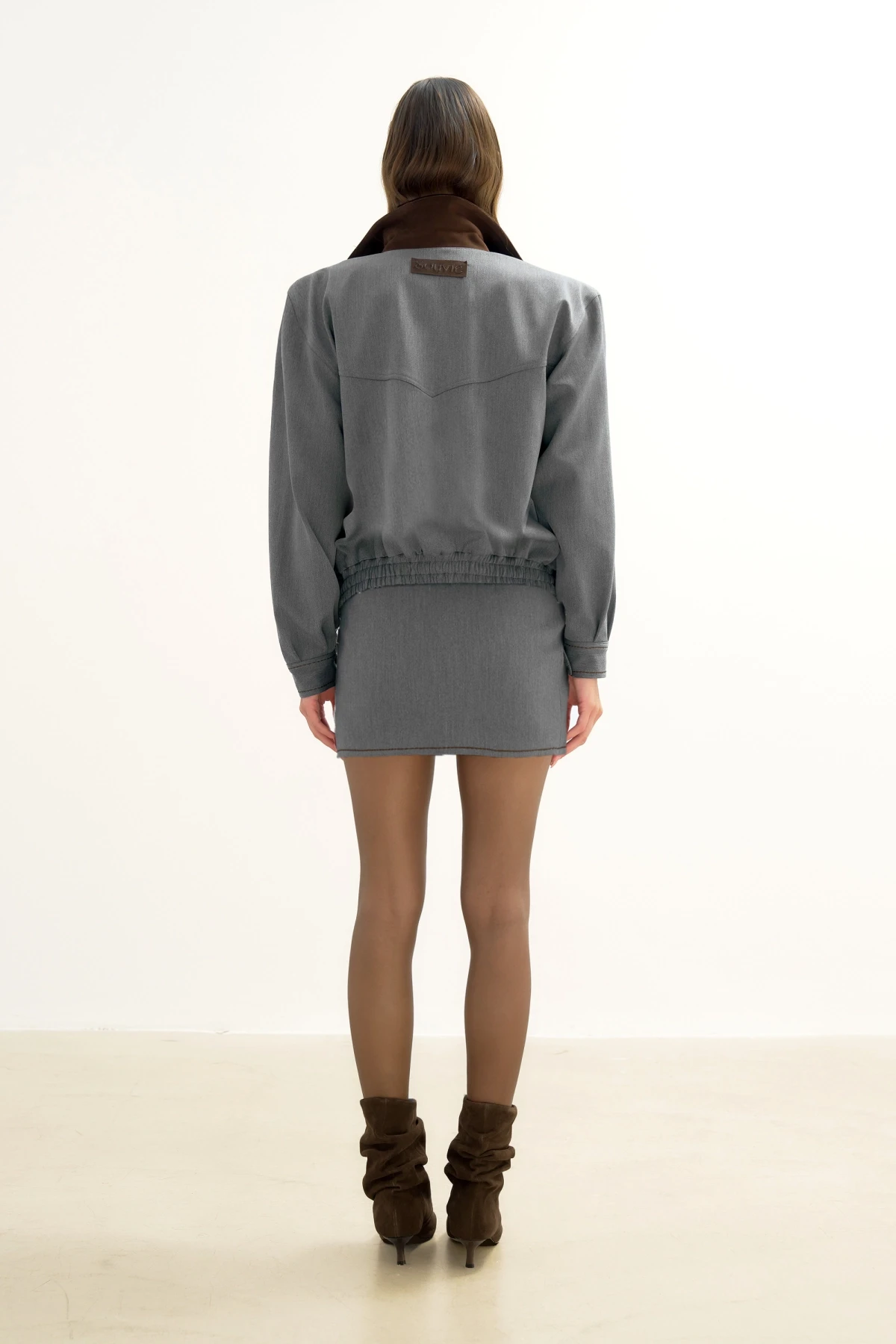 GRAY MINI SKIRT WITH BROWN STITCHING DETAIL