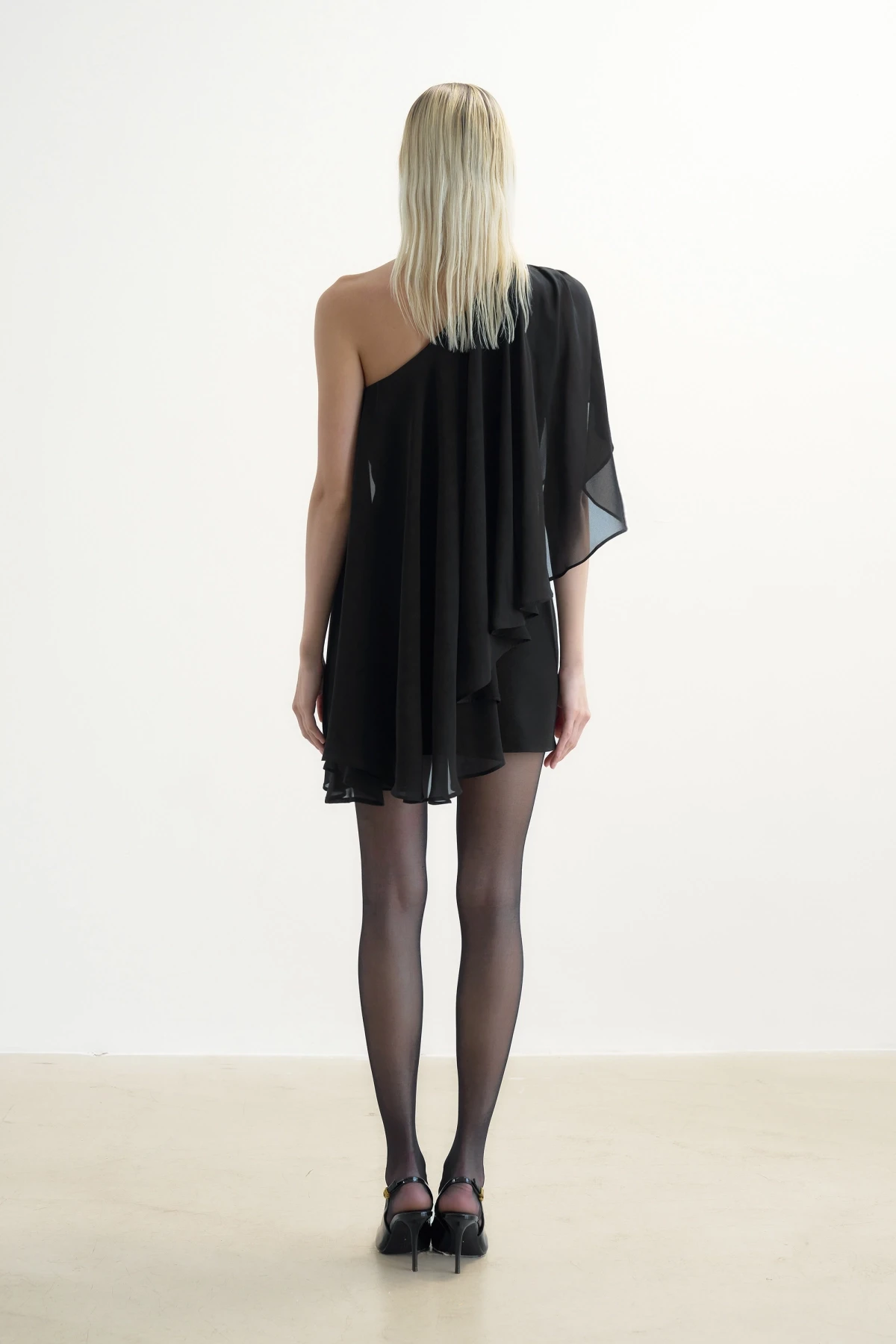 BLACK ONE-SHOULDER MINI DRESS WITH CAPE DETAIL