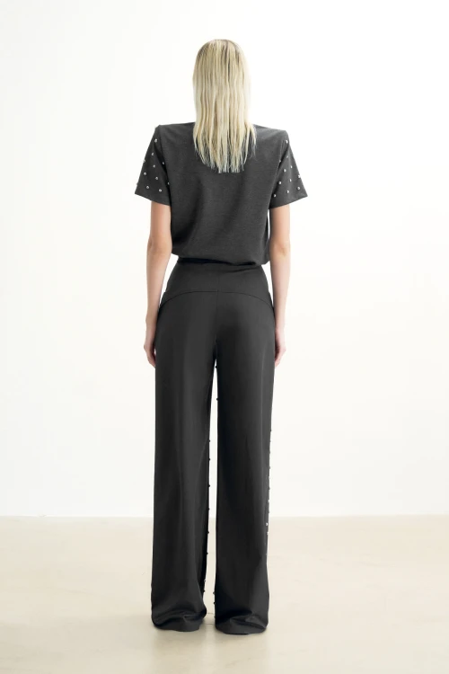 GRAY TROUSERS WITH METALLIC STONE PRINT