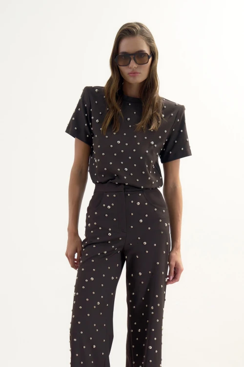 BROWN TROUSERS WITH METALLIC STONE PRINT