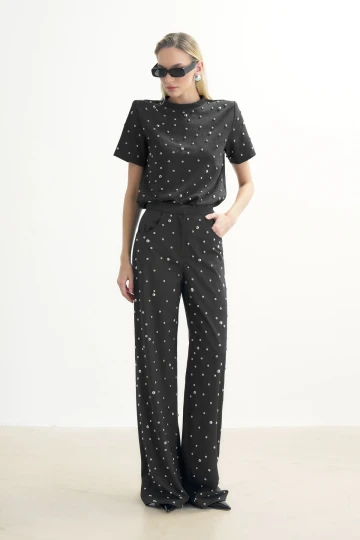 GRAY TROUSERS WITH METALLIC STONE PRINT