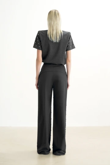 GRAY TROUSERS WITH METALLIC STONE PRINT
