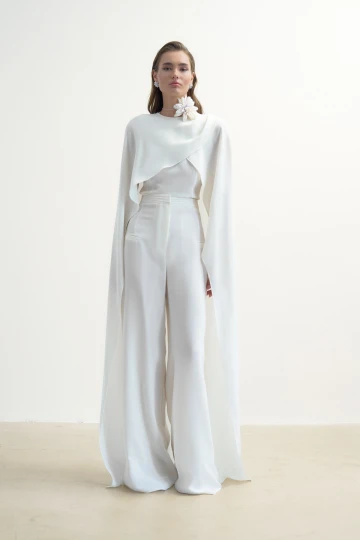 OFF-WHITE TOP WITH CAPE DETAIL